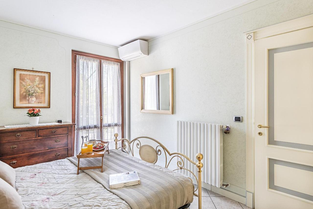 I Mosaici Apartments By Wonderful Italy Sirmione Bagian luar foto